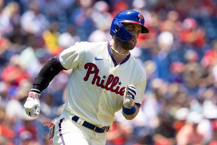 Bryce Harper rounds first base after hitting a single against the Miami Marlins.